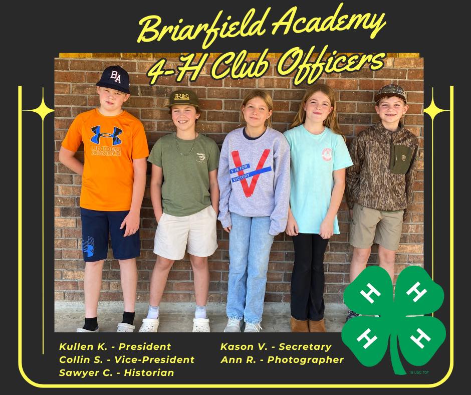 Briarfield Academy 4-H Club Officers. 4-H Emblem logo. Five kids posing for a photo.